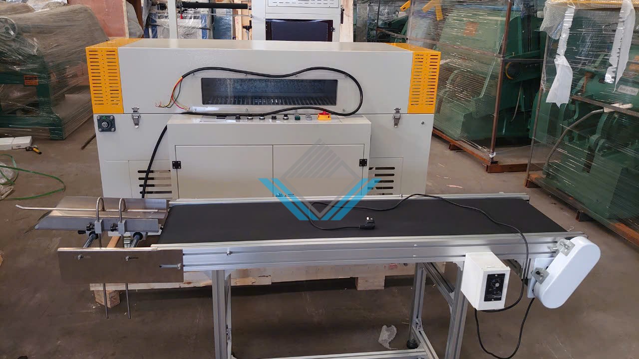 Máy bọc màng co sách tự động